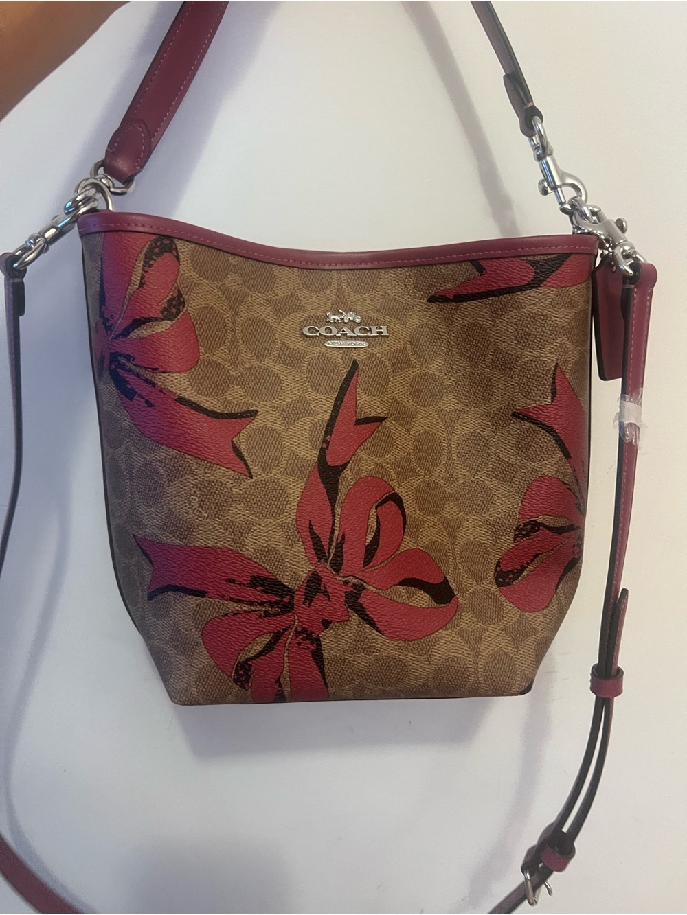 COACH Pink Bow Brown Signature Canvas Bucket Bag